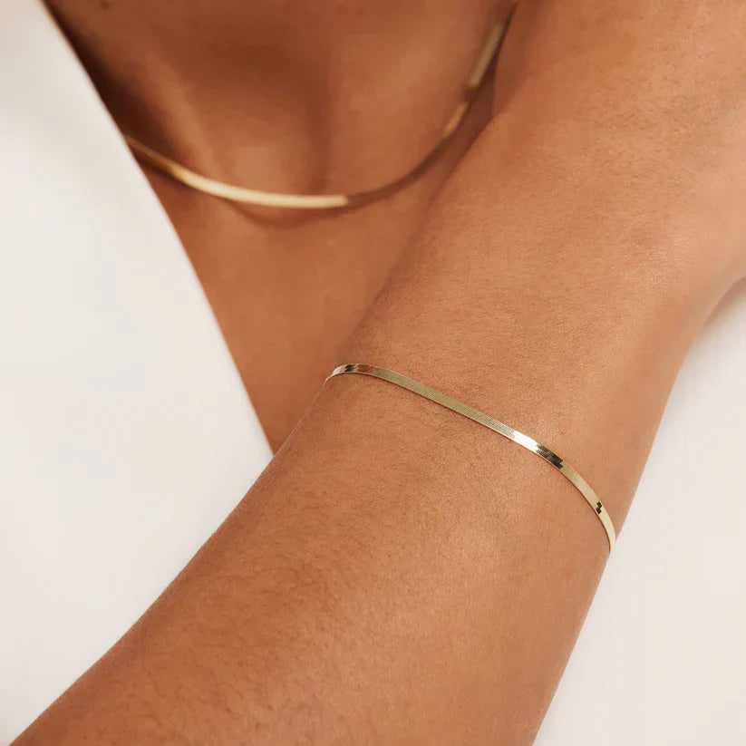 Lynor™ | Soleil Serpent Bracelet – Radiant 14K Gold with a Sleek Serpent Design