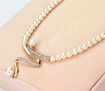 Lynor™ | Pearl Necklace + Earrings